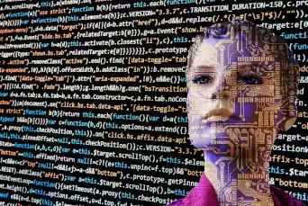 Artificial Intelligence man looking like android with code behind him