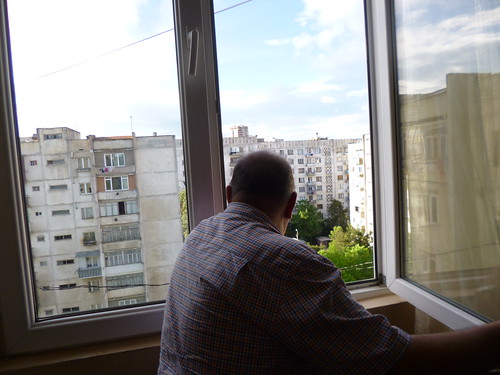 Man looking out a window